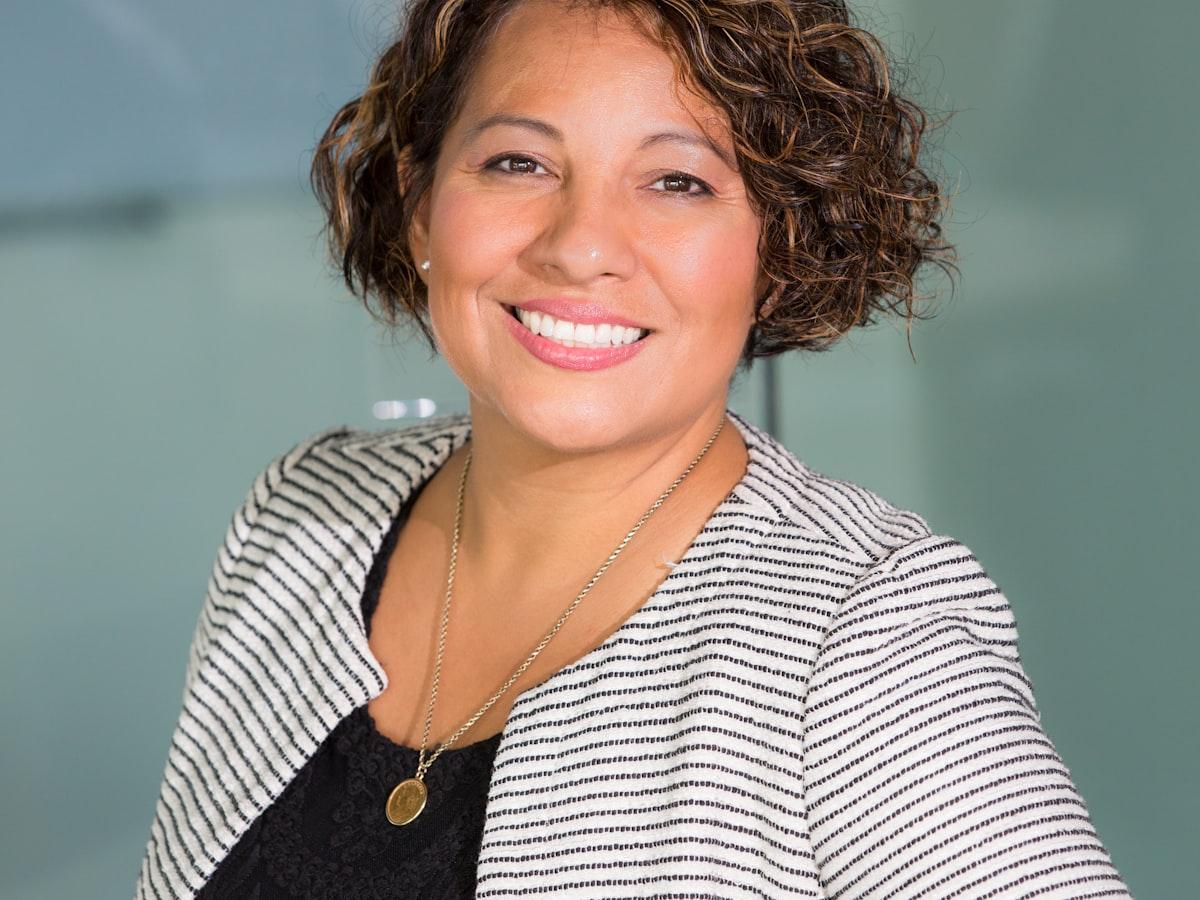 Black professional leading a team discussion